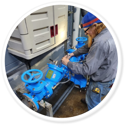 someone working on a commercial pipe